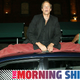 TORONTO - SEPTEMBER 6: Actor Woody Harrelson from the film “Go Further” sits on the roof of a tiny electric car at the film’s after party during the 2003 Toronto International Film Festival on September 6, 2003 in Toronto, Canada. (Photo by Carlo Allegri/Getty Images)